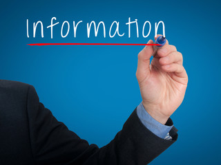 Businessman hand writing information. Blue backagound