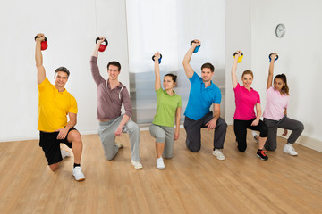 People Working Out With Kettle Bell Weights