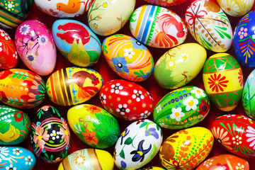 Fototapeta na wymiar Handmade Easter eggs background. Spring patterns art, unique.