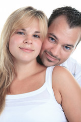 caucasian couple expecting baby smiling cheerful isolated studio