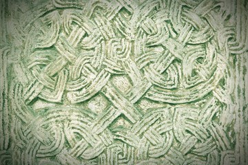 Stone ornament in Milan, Italy. Cross processed tone.