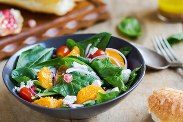 Orange with spinach, pomegranate and feta cheese salad