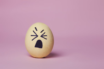 Weepy yellow painted egg