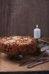 Homemade apple pie on wooden background