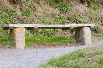 Wooden bench on hillside