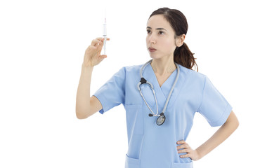 Female nurse holding a a syringe