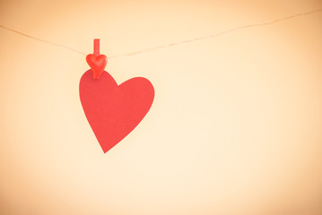 Paper heart hanging on a rope, with vignette