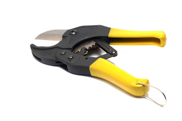 large pliers for pipes with yellow handles on white