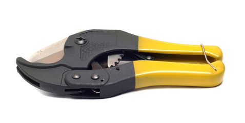 large pliers for pipes with yellow handles on white