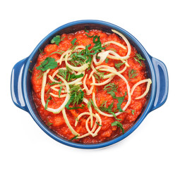 Tomato soup in bowl isolated on white background