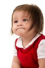 Naklejka premium portrait of adorable brunette baby girl wearing red dress