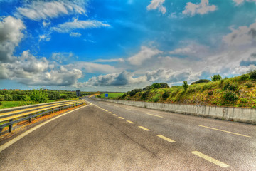 country road under a scenic sky in hdr