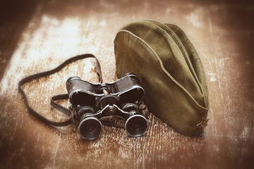 Soldier field cap, military binoculars.May 9 Victory Day