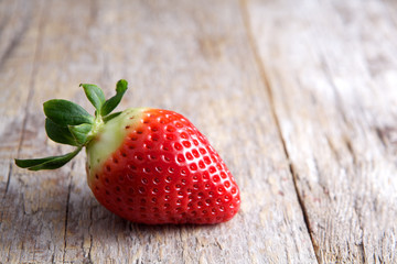 Strawberry on wood