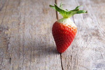 Strawberry on wood
