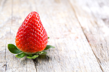 Strawberry on wood