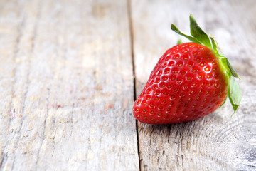 Strawberry on wood