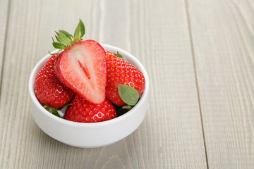 fresh organic strawberries in bowl