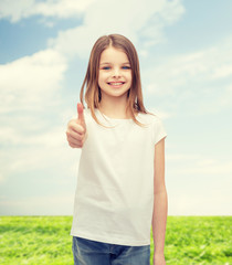 girl in blank white t-shirt showing thumbs up