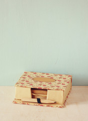 Vintage romantic memo with wooden old pencil. retro filtered ima