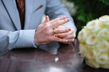 bride with a wedding ring on his hand