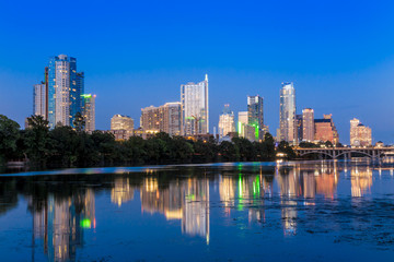 Naklejka na ściany i meble Beautiful Austin skyline reflection at twilight