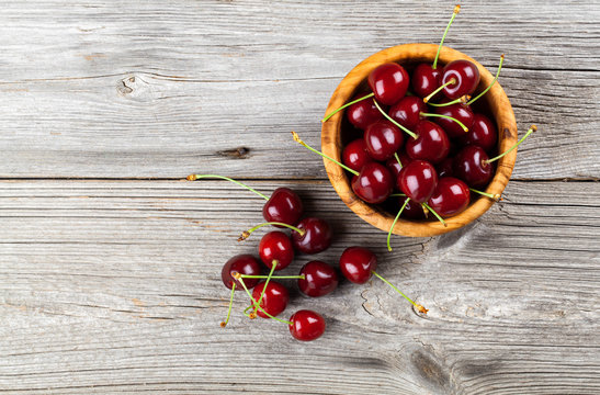 Sweet cherry, on wooden background