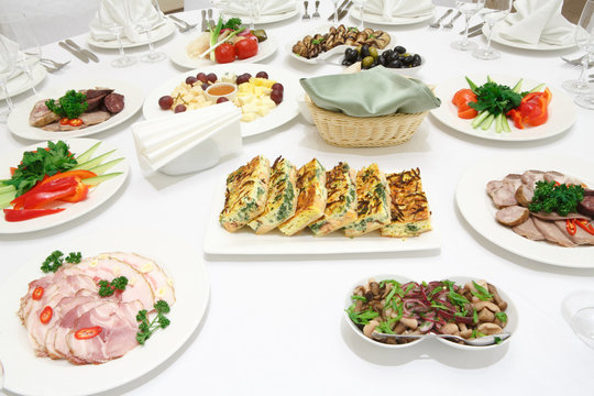 Catering - served table with various cold appetizers