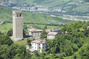Fototapeta na wymiar Exterior of the medieval basilica in San Leo, Italy.