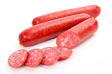 Smoked sausages isolated on white background