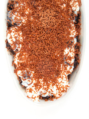 ice cream with prunes and chocolate isolated on white