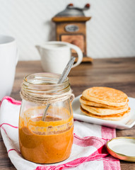 Peanut Butter and Fresh peanut butter on wooden background