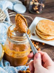 peanut butter in a jar, eat a teaspoon and pancakes