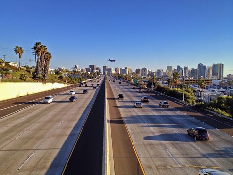 Freeway with plane landing, Downtown San Diego, California, USA