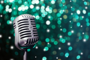 Retro microphone on bright background, Karaoke concept
