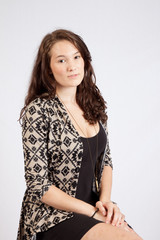 Obraz premium Woman sitting thoughtfully