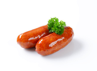 Two grilled sausages