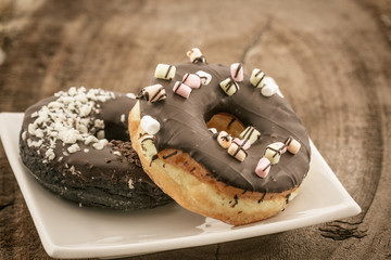 Chocolate donut with Sprinkles .