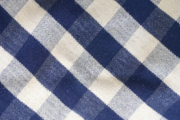 background of blue and white check picnic tablecloth fabric