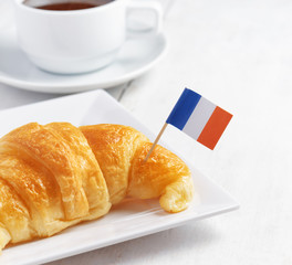 Cup of coffee and croissant in Paris