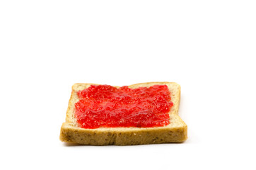 slice of bread with strawberry jam