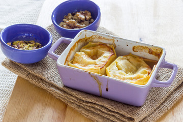 Baked apple with honey and pistachio nuts