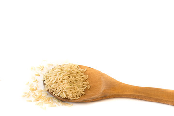 Brown Rice on Wood Ladle .