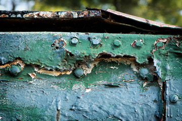 Old Paint Peeling off a Garbage Dumpster Background