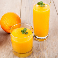 Fresh orange and ginger smoothie drink