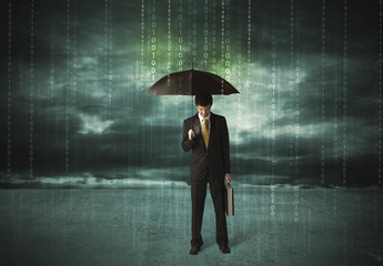 Business man standing with umbrella data protection concept