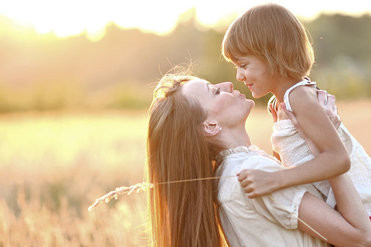 portrait of mother and daughter in nature