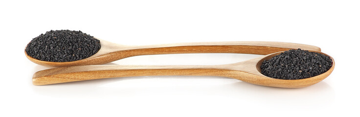 Black Sesame Seeds in wooden spoon isolated on white background