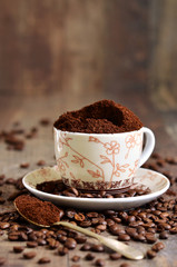 Ground coffee and coffee beans.
