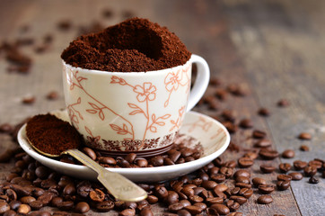 Ground coffee and coffee beans.
